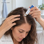 Bodywise roll-on applied directly to a clearly exposed scalp part.